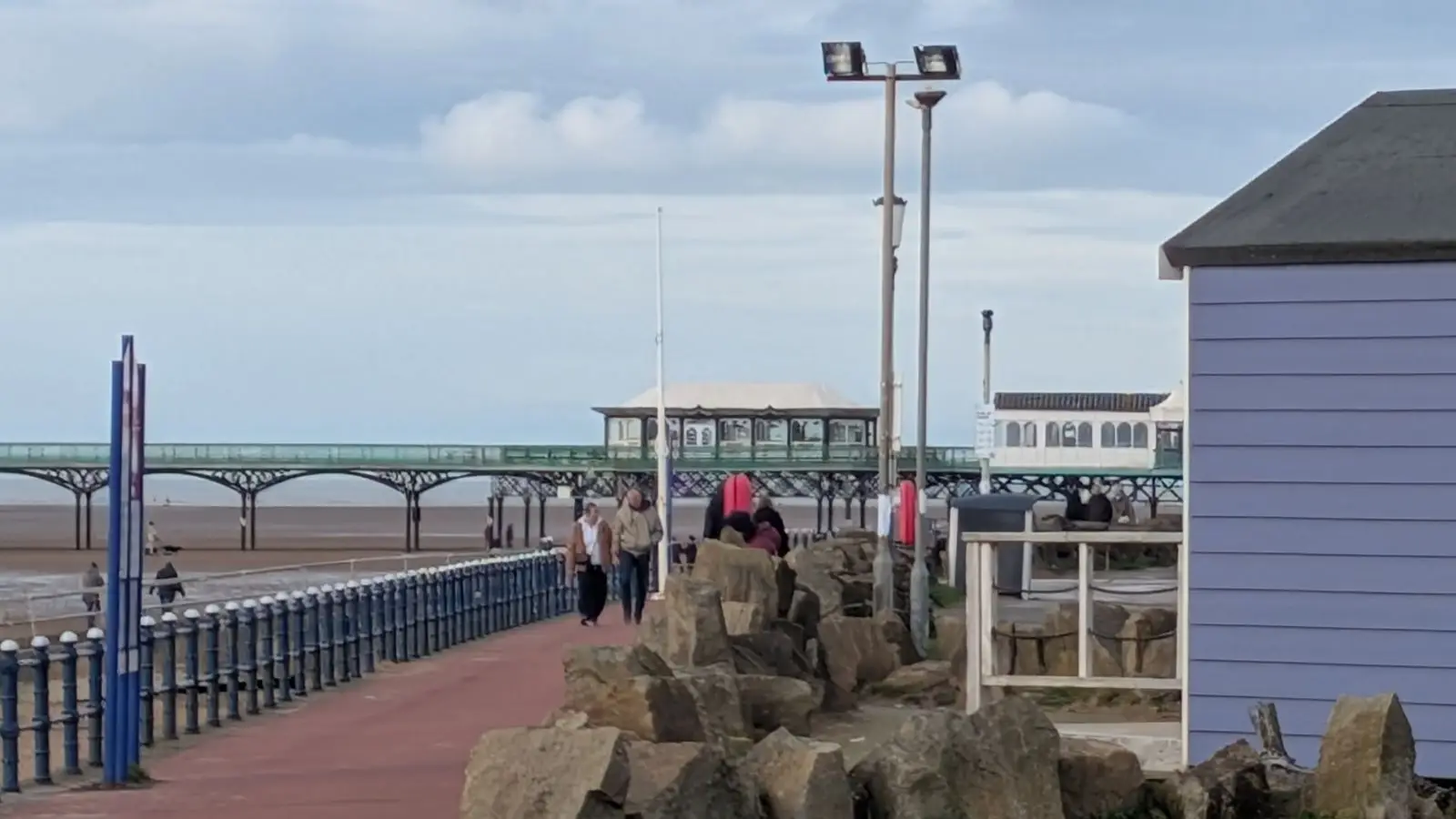 RICS Home Surveys Lytham St Annes | Level 2 & 3 St Annes Pier viewed from the promenade beside a beach hut