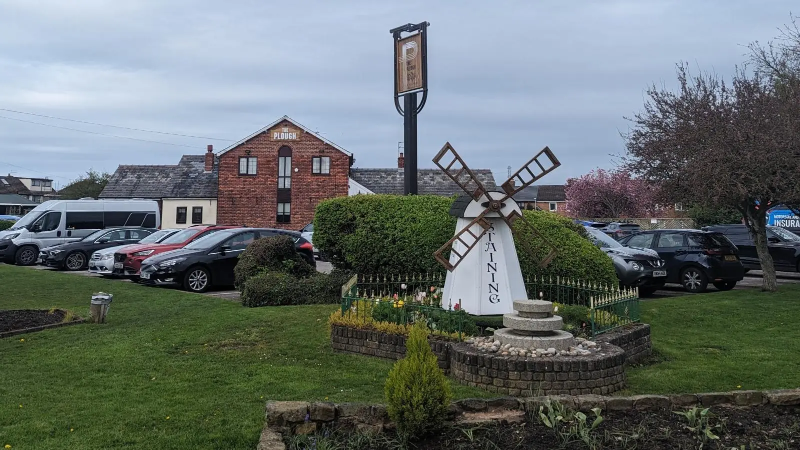 Decorative village windmill feature in Staining, Lancashire